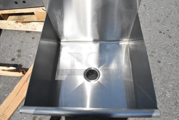 Brand new Regency stainless steel single bay sink, scratch and dent, no legs, shiny finish, viewed from top.