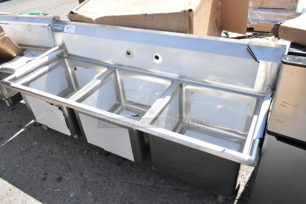 Brand new Regency 600S31717 60" commercial sink, three 17"x17"x12" compartments, stainless steel, galvanized legs, scratch and dent.