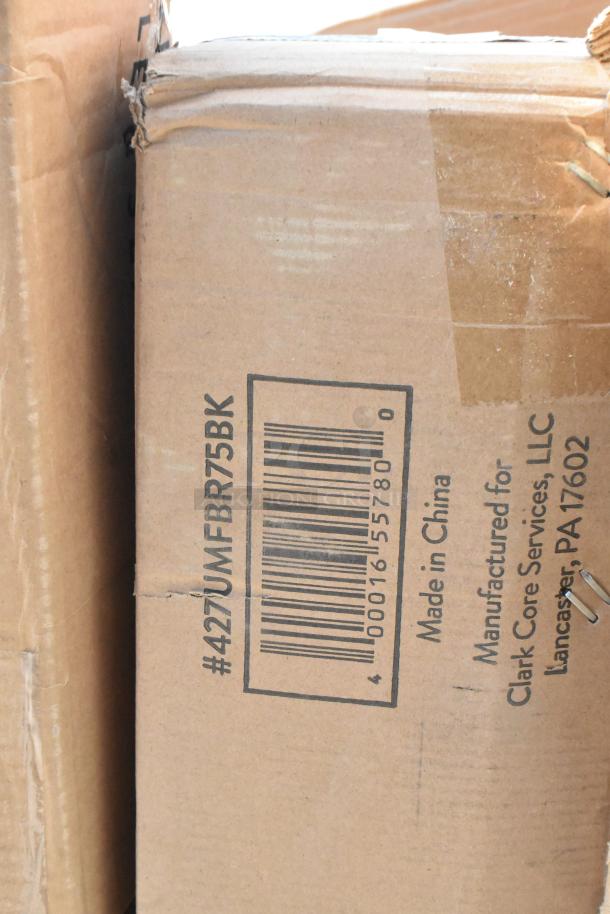 Damaged box labeled "427UMFBR75BK," indicating contents from Clark Core Services, Lancaster, PA.
