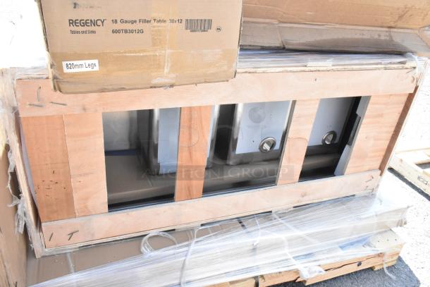 5 new Scratch and Dent items including Regency 30"x12" 18-gauge table in original packaging, unopened, with labels.