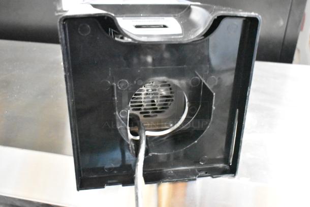 Blendtec countertop blender with pitcher and enclosure, functioning at 120 volts, 1 phase, in good condition, black base shown.