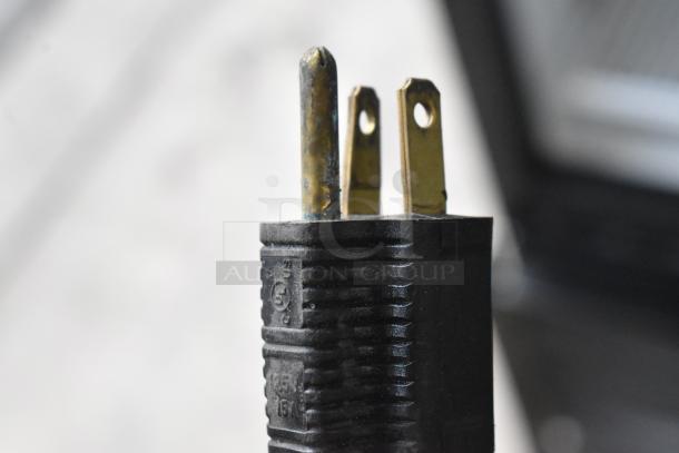 Close-up of the Criotec CFX-26 BB HC cooler's power plug, showing three-prong configuration for 115 Volts, 1 Phase.
