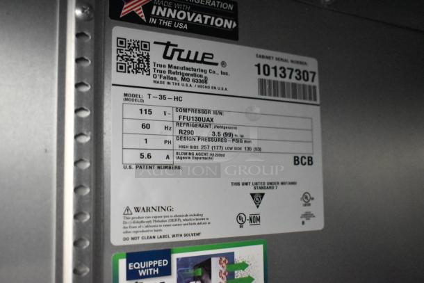 2021 True T-35-HC stainless steel cooler label showing model, voltage, refrigerant R290, and compliance certifications.