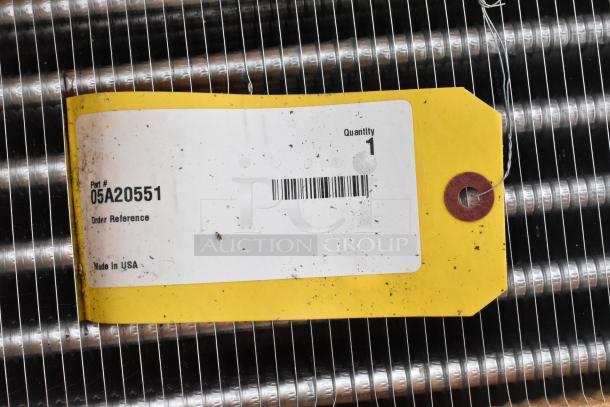 Brand new 2023 evaporator coil, part #05A20551, tagged "Made in USA," in original crate, pristine condition.