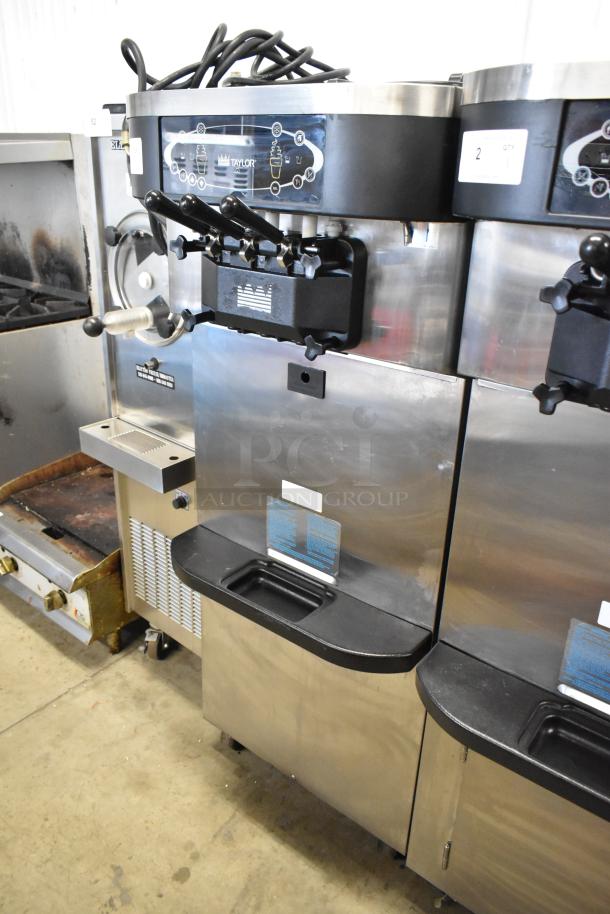 Taylor C723-33 stainless steel 2-flavor soft serve ice cream machine, floor model, water-cooled, on casters, 208-230V, 3-phase.