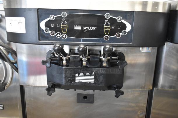 Taylor C723-33 stainless steel soft serve machine, 2-flavor twist, water-cooled, commercial casters, 208-230V, 3-phase.