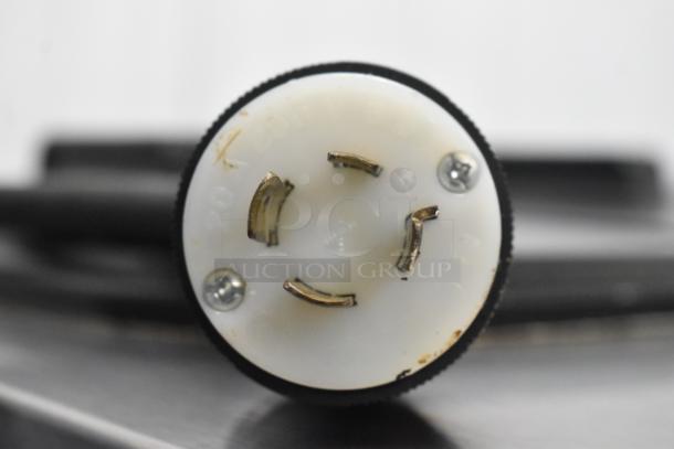Taylor C723-33 soft serve ice cream machine plug, 208-230 volts, 3 phase, on commercial casters, stainless steel.