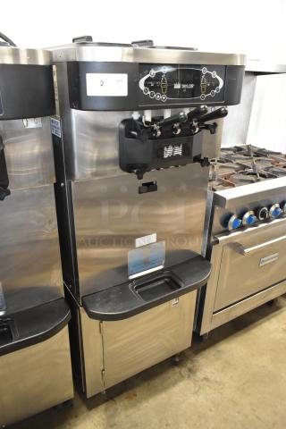 Taylor C723-33 stainless steel soft serve ice cream machine, 2 flavors plus twist, on commercial casters, water cooled, 208-230V, 3 phase.