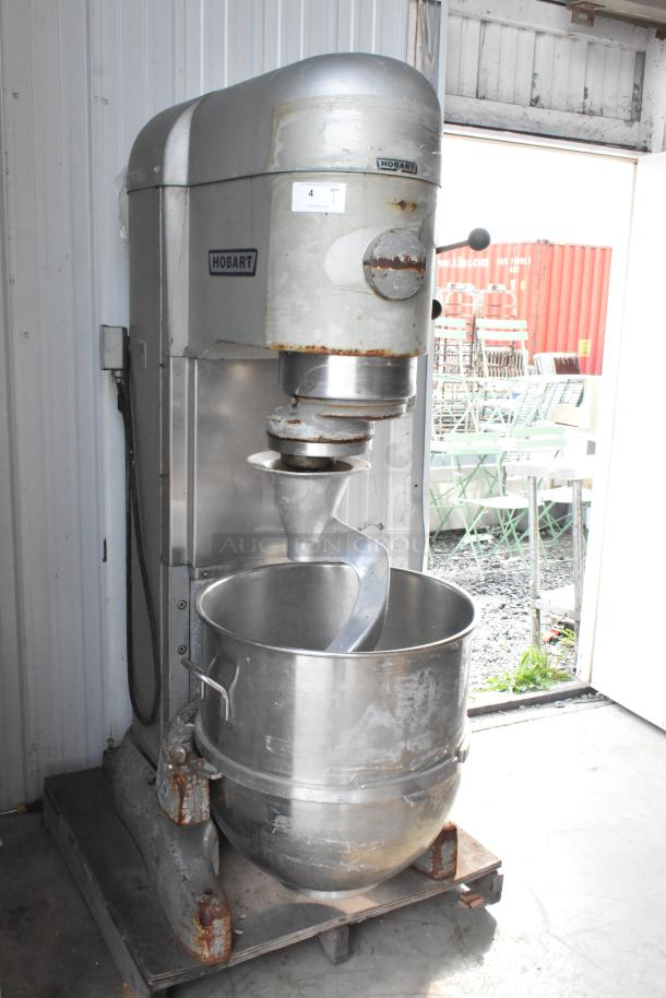 Hobart V-1401 commercial dough mixer, 140 qt with bowl, hook attachment, visible wear, 200V, 3-phase, metal construction.
