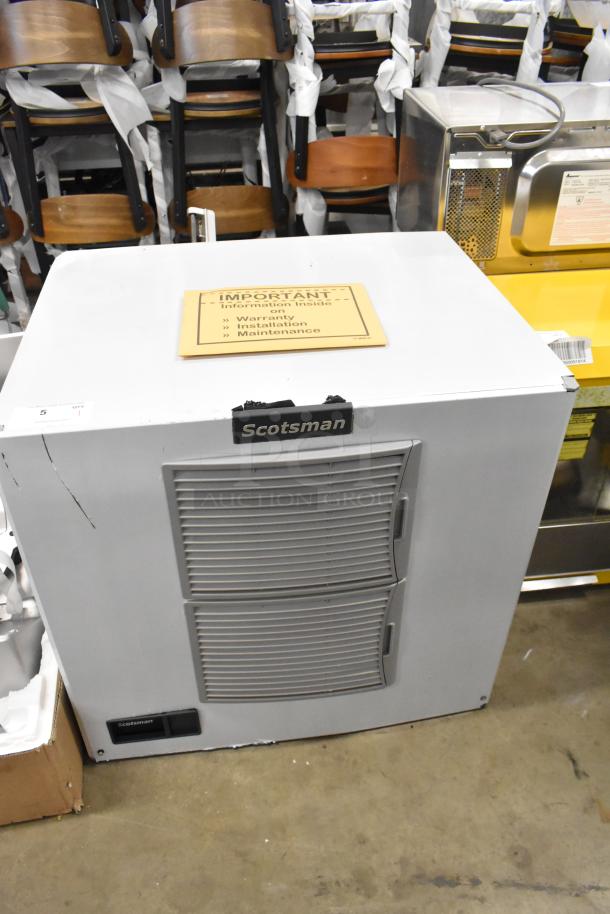BRAND NEW SCRATCH AND DENT Scotsman MC1030MA-32A ice machine head, stainless steel, 208/230V, 1 phase, warranty info label.