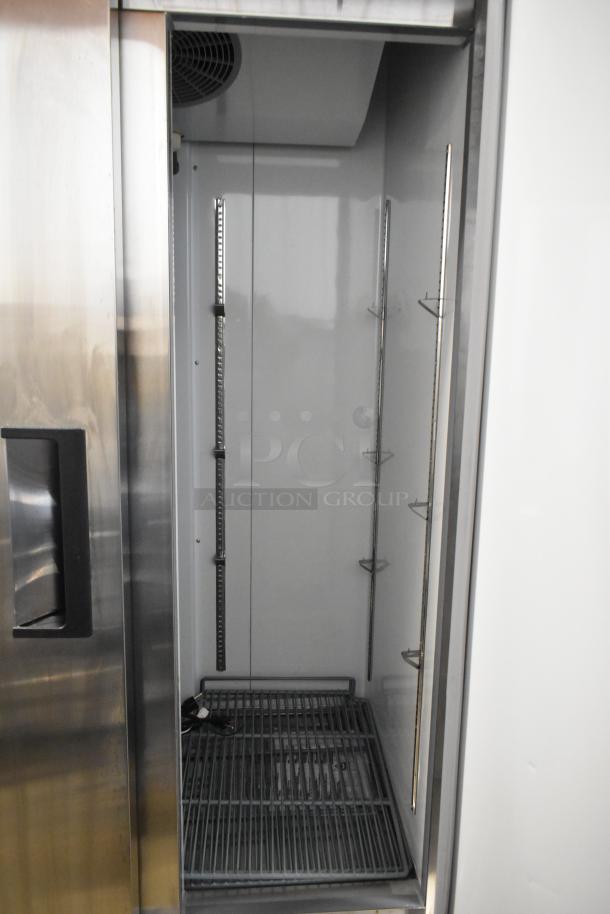 Brand new Avantco 178A35RHC stainless steel commercial 2-door cooler, poly-coated racks, 115V, minor scratches.