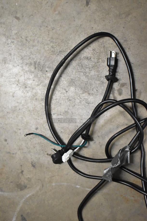Power cord for Avantco 178A35RHC cooler, showing plug and wiring with tape, possibly for connection or repair.