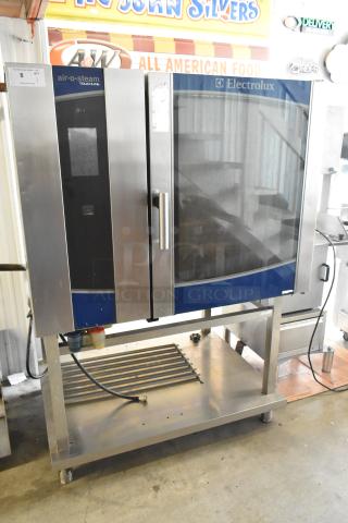 2016 Electrolux AOS102GTP1 stainless steel commercial gas combi convection oven on stand, features touchline interface.