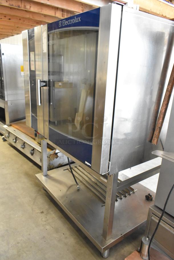 2016 Electrolux AOS102GTP1 stainless steel commercial gas convection oven on stand, featuring Touchline controls.