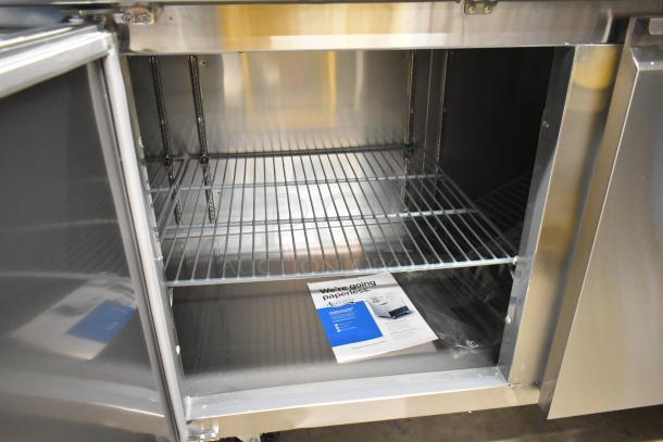 Brand new Avantco 178SSUD3R stainless steel 3-door undercounter cooler, scratch and dent, on casters, 115V, 1 Phase.
