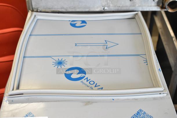 Stainless steel undercounter ice machine, model C-80BAK by Hoshizaki. Slight dents visible. 27 lb. bin, 92 lb. output.