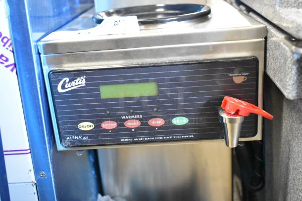 Curtis ALP3GT63A000 Stainless Steel Commercial 12 Cup Coffee Brewer, new with minor scratches, has 1 lower and 2 upper warmers.