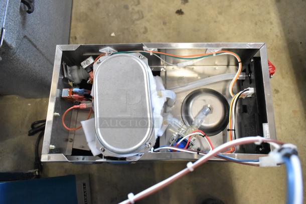 Brand new Curtis ALP3GT63A000 stainless steel 12-cup coffee brewer interior. Features hot water dispenser, 1 lower, 2 upper warmers.