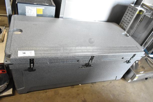 Brand new CaterGator CG200PG gray 210 qt. rotomolded outdoor cooler with minor scratches; secure latches visible.