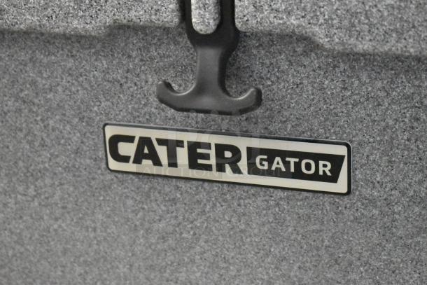 CaterGator CG200PG gray rotomolded cooler, 210 Qt., scratch and dent condition, with signature brand label.