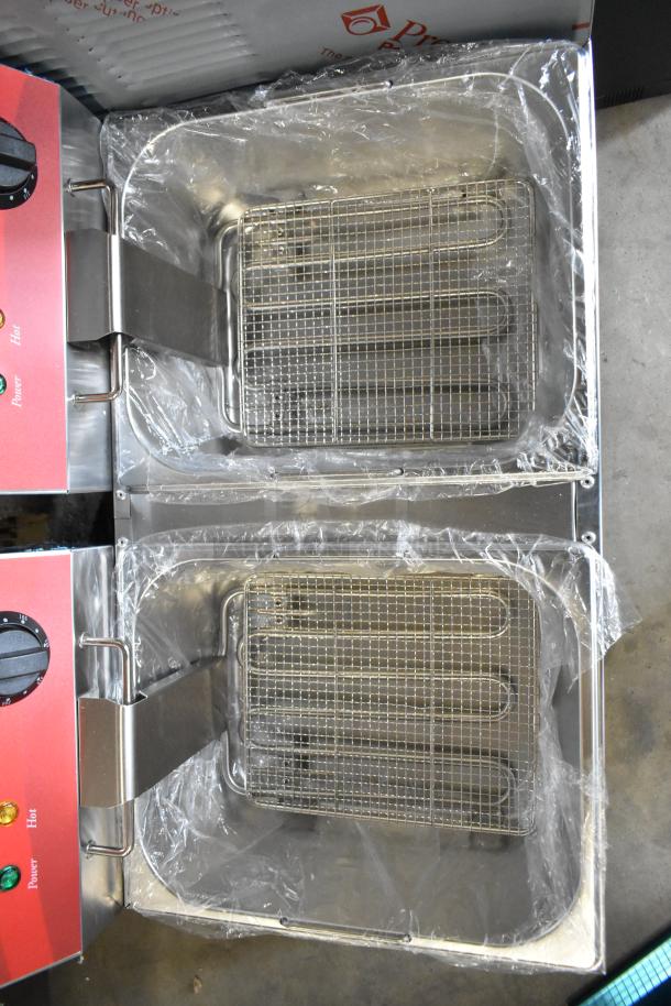 BRAND NEW Avantco 177F102 dual tank electric fryer, 20 lb. capacity, with 2 metal baskets and lids, 120V, 1 Phase.
