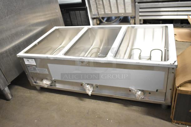 BRAND NEW ServIt 423EST3WO stainless steel three-pan electric steam table, adjustable undershelf, 120V, 1 phase.