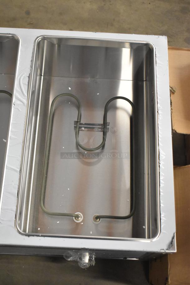 "ServIt 423EST3WO stainless steel steam table, three-pan capacity, open well, adjustable undershelf, brand new, minor scratches."