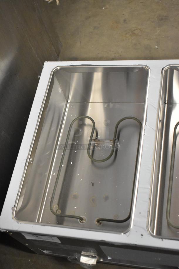 BRAND NEW ServIt 423EST3WO stainless steel three-pan electric steam table with adjustable undershelf, 120V, 1 phase, scratch and dent condition.