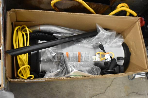 Brand new ProTeam LV-100 backpack vacuum in box. Includes attachments and power cord. 120 Volts, 1 Phase. Scratch and dent condition.
