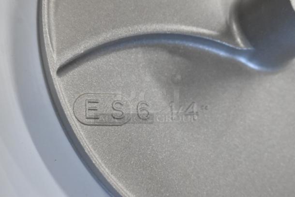 Close-up of a Robot Coupe 28196W 1/4" slicing disc top view with visible marking "ES 6 1/4 cce." Brand new condition.