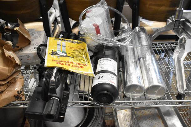 BRAND NEW Everpure EV9797-22 Kleensteam II Twin Water Filtration System, 5 Micron, 5 GPM; visible instructions and parts on a metal shelf.