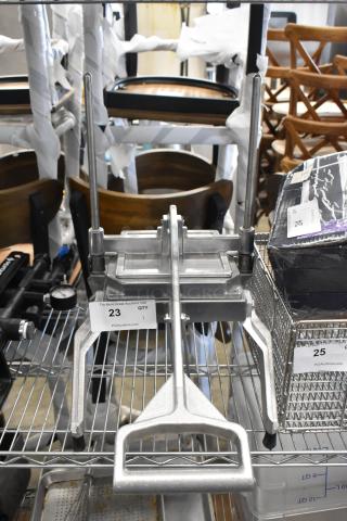 Brand new Nemco 55650 Easy Lettuce Cutter, scratch and dent, metal construction, on auction shelf, tag showing item 23.