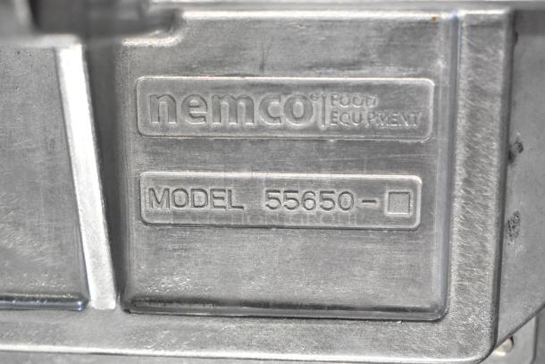 Brand new Nemco 55650 Easy Lettuce Cutter with visible scratch and dent. Model number and brand embossed on metal surface.
