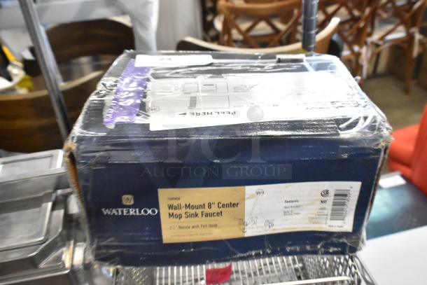 BRAND NEW Waterloo 750FMS8 Wall-Mounted Mop Sink Faucet, 8" centers, box shows minor dents, features listed on packaging.