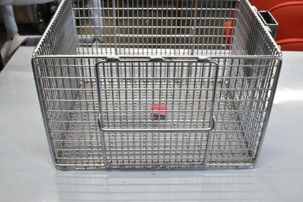 Brand new Henny Penny 186010 nugget fryer basket for 600 gas fryer. Stainless steel, minor scratches and dents visible.