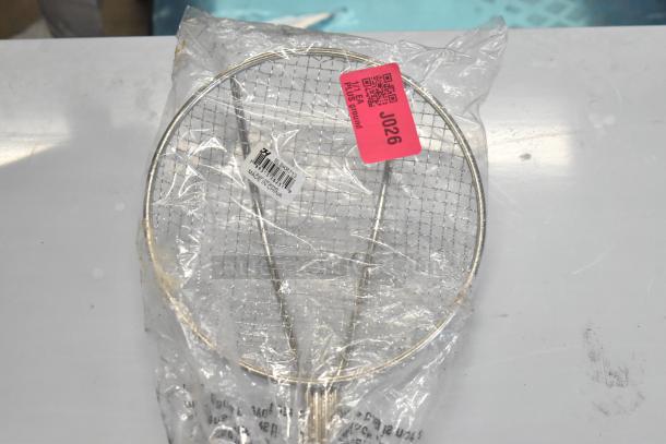 New SLSKR713 skimmer in packaging, stainless steel, with labels "Made in China" and red tag "J026." Scratch and dent.