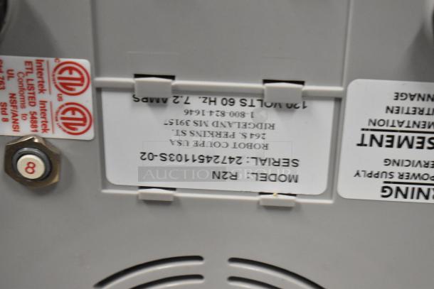 Robot Coupe R2 food processor label showing model, serial number, and voltage details.