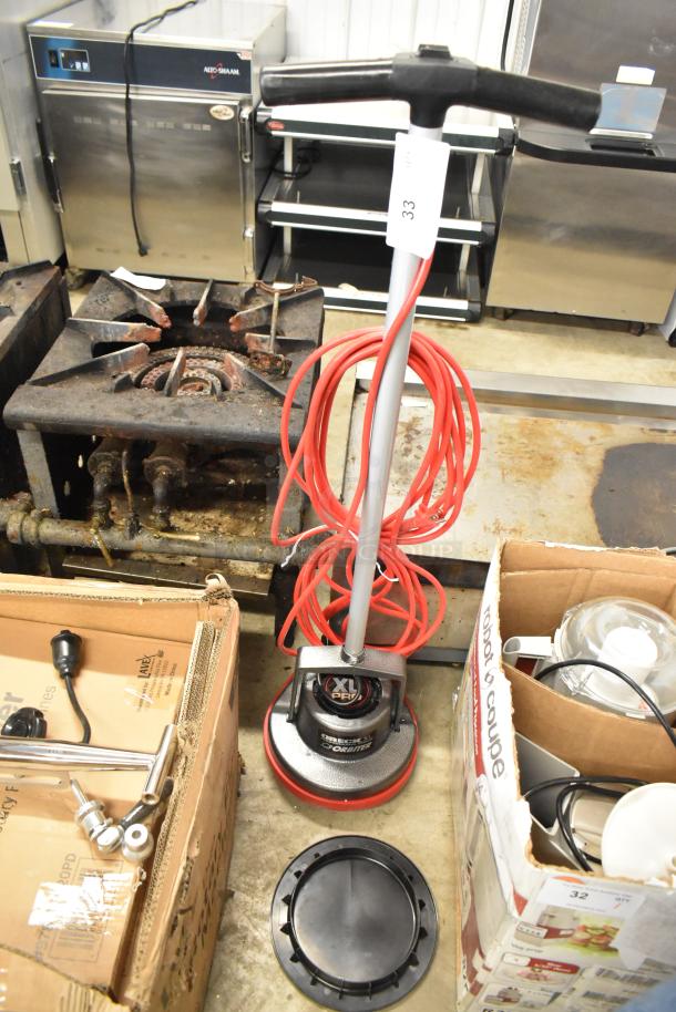 BRAND NEW Oreck 550MC Orbiter 12" Floor Machine, 115V, 1 Phase, with red power cord. Minor scratches and dents visible.