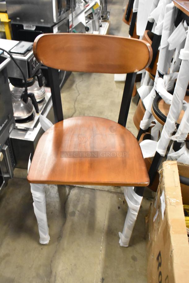 Brand new Lancaster dining height chair, black metal frame, wooden backrest and seat, scratch and dent condition.