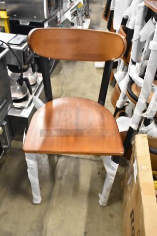 Brand new Lancaster dining height chair, black metal frame, wooden backrest and seat, scratch and dent condition.