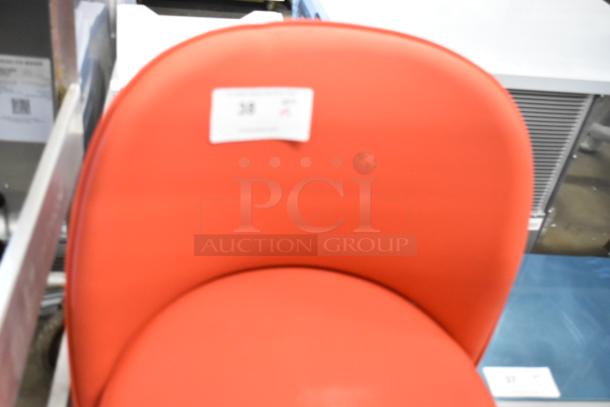 Red bucket seat, brand new, no legs, labeled as "Scratch and Dent." Auction offers 5 times your bid.