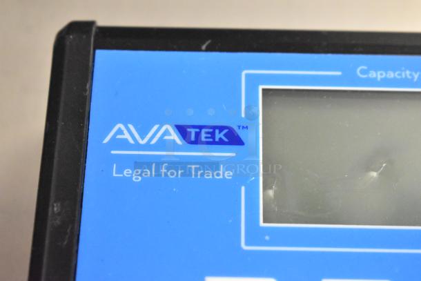 "BRAND NEW AvaWeigh BS70 70 lb. Receiving Scale close-up, showing 'Legal for Trade' marking on blue display panel."