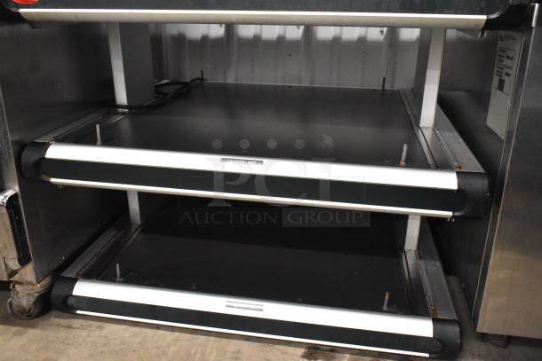Hatco GR2SDH-24D metal commercial heated display shelf, 120V, 1 phase. Two-tier, caution labels visible, good condition.