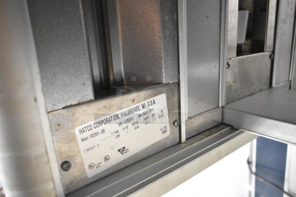 Hatco GR2SDH-24D metal commercial heated display shelf, 120V, 1 phase; label showing model details and UL certification.