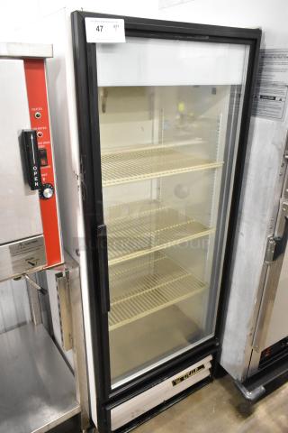 True GDM-12 single door cooler merchandiser, metal, 4 shelves, glass door, 115 volts, 1 phase, excellent condition.