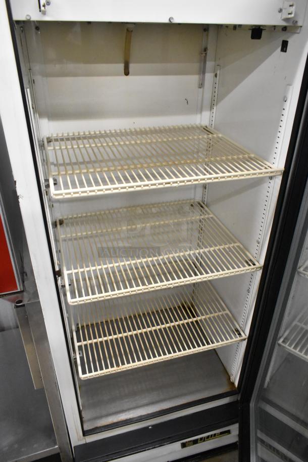 True GDM-12 metal cooler merchandiser, single door, 115V, 1 phase, metal shelves, commercial use, clean condition.