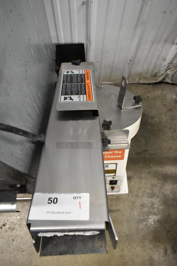 Oliver 702-N metal countertop bagel slicer, commercial-grade, 115 volts, 1 phase, with visible safety and usage labels.