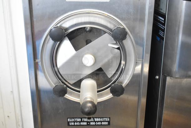 Electro Freeze 876-214 stainless steel single flavor frozen beverage machine, commercial casters, 115V, 1 phase.