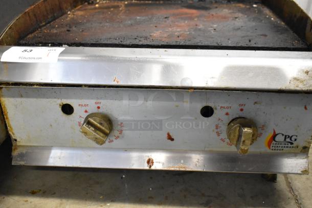 Cooking Performance Group countertop gas griddle, stainless steel, dual control knobs, fair condition, visible usage marks.