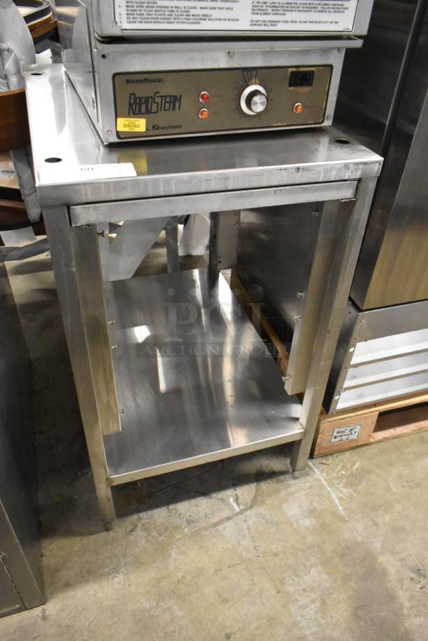 Stainless Steel Equipment Stand with under shelf, sturdy condition, smooth surface, ideal for kitchen or industrial use.